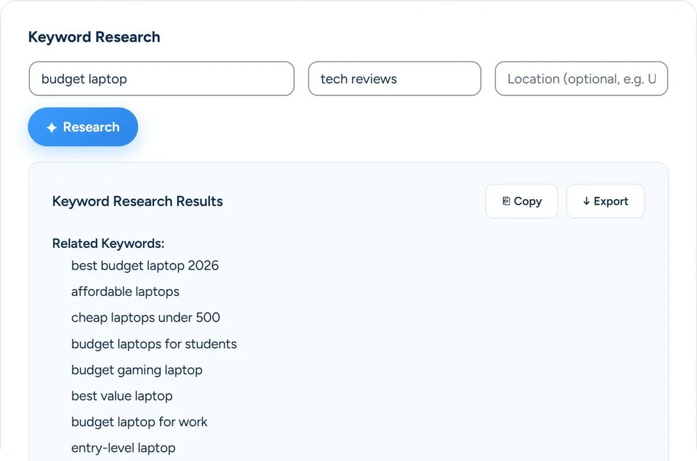Keyword Research in SEO & Chill on our test site: the seed topic budget laptop with the niche tech reviews, the Research button, and the first related keywords from the AI, such as best budget laptop 2026, cheap laptops under 500 and budget laptops for students, with Copy and Export